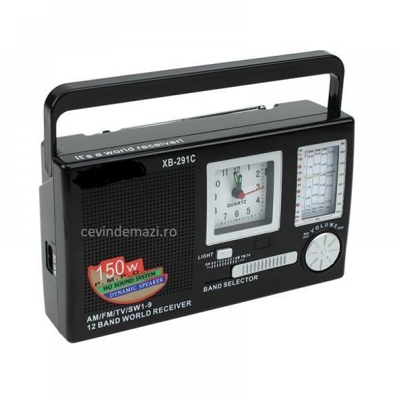 Radio Portabil cu Ceas, 12 Frecvente Radio, Control Volum, Ceas Analog, Antena Telescopica, Alimentare Baterii&Retea, Maner Transport, Dimensiuni Reduse, Negru